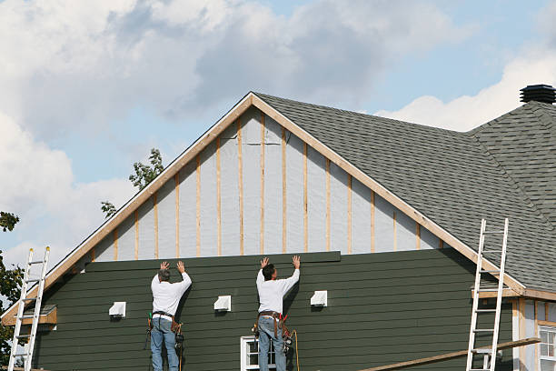 Professional Storm Damage Siding Repair technician working in Waynesboro, PA